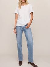 Load image into Gallery viewer, Woman wearing white Foundation Slub Tee with blue high-waist jeans, styled with gold bracelet and rings - 4
