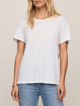 Load image into Gallery viewer, Woman wearing white Foundation Slub Tee with blue high-waist jeans, styled with gold bracelet and rings - 2
