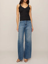 Load image into Gallery viewer, Eve Lace Tank in black with scalloped lace neckline and straps, paired with high-waist wide-leg jeans - 3
