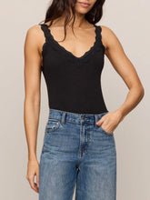Load image into Gallery viewer, Eve Lace Tank in black with scalloped lace neckline and straps, paired with high-waist wide-leg jeans - 1
