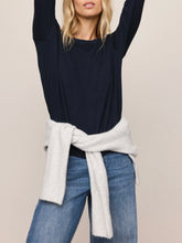 Load image into Gallery viewer, Woman wearing Junie Long Sleeve Tee in Eclipse navy blue with crew neck, paired with light wash jeans - 5
