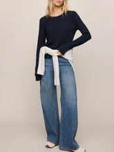 Load image into Gallery viewer, Woman wearing Junie Long Sleeve Tee in Eclipse navy blue with crew neck, paired with light wash jeans - 3
