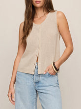 Load image into Gallery viewer, Woman wearing Syd Sweater Vest in Sandstone beige knit with button front, paired with light wash jeans - 1
