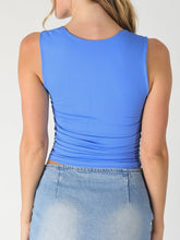 Load image into Gallery viewer, Woman wearing blue square neck shirred tank top with ruched sides paired with light wash denim skirt - 6

