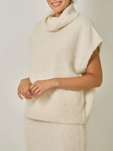 Load image into Gallery viewer, Ivory sequin sleeveless turtleneck sweater in soft knit fabric, paired with matching knit skirt - 3
