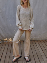Load image into Gallery viewer, Woman wearing natural beige open knit boat neck sweater with wide brim hat and cream ribbed pants - 4
