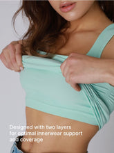 Load image into Gallery viewer, Woman wearing blue square neck shirred tank top with ruched sides paired with light wash denim skirt - 2
