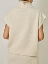 Load image into Gallery viewer, Ivory sequin sleeveless turtleneck sweater in soft knit fabric, paired with matching knit skirt - 4
