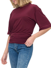 Load image into Gallery viewer, Woman wearing oversized wine burgundy ruched waist tee with half sleeves paired with blue jeans - 2
