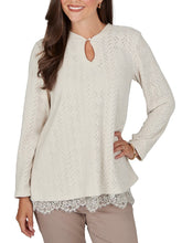 Load image into Gallery viewer, Oatmeal chevron knit long sleeve top with keyhole neckline and layered lace hem cami, paired with dark jeans - 2
