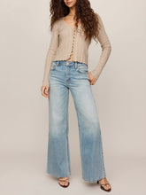 Load image into Gallery viewer, Woman wearing Landa Sweater Top in Natural, beige ribbed knit button-front crop cardigan with V-neck and blue jeans - 4
