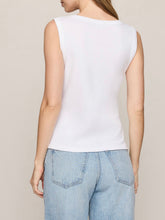 Load image into Gallery viewer, Ellie white v-neck sleeveless tank top styled with light wash wide-leg jeans on female model - 4
