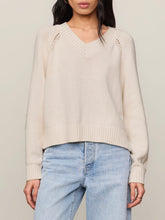 Load image into Gallery viewer, Stratton V-neck cream knit sweater with raglan detail and ribbed hem paired with light wash jeans - 1
