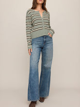 Load image into Gallery viewer, Medina striped cardigan in sage green with cream and brown stripes, button-front knit style paired with blue jeans - 4
