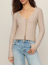 Load image into Gallery viewer, Woman wearing Landa Sweater Top in Natural, beige ribbed knit button-front crop cardigan with V-neck and blue jeans - 2
