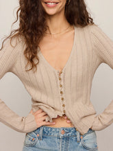 Load image into Gallery viewer, Woman wearing Landa Sweater Top in Natural, beige ribbed knit button-front crop cardigan with V-neck and blue jeans - 1
