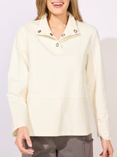 Load image into Gallery viewer, Woman wearing pearl white terry quarter snap pullover sweatshirt with grommet details and collar - 1
