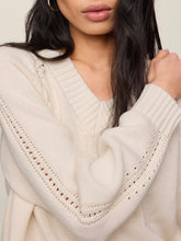 Load image into Gallery viewer, Stratton V-neck cream knit sweater with raglan detail and ribbed hem paired with light wash jeans - 4
